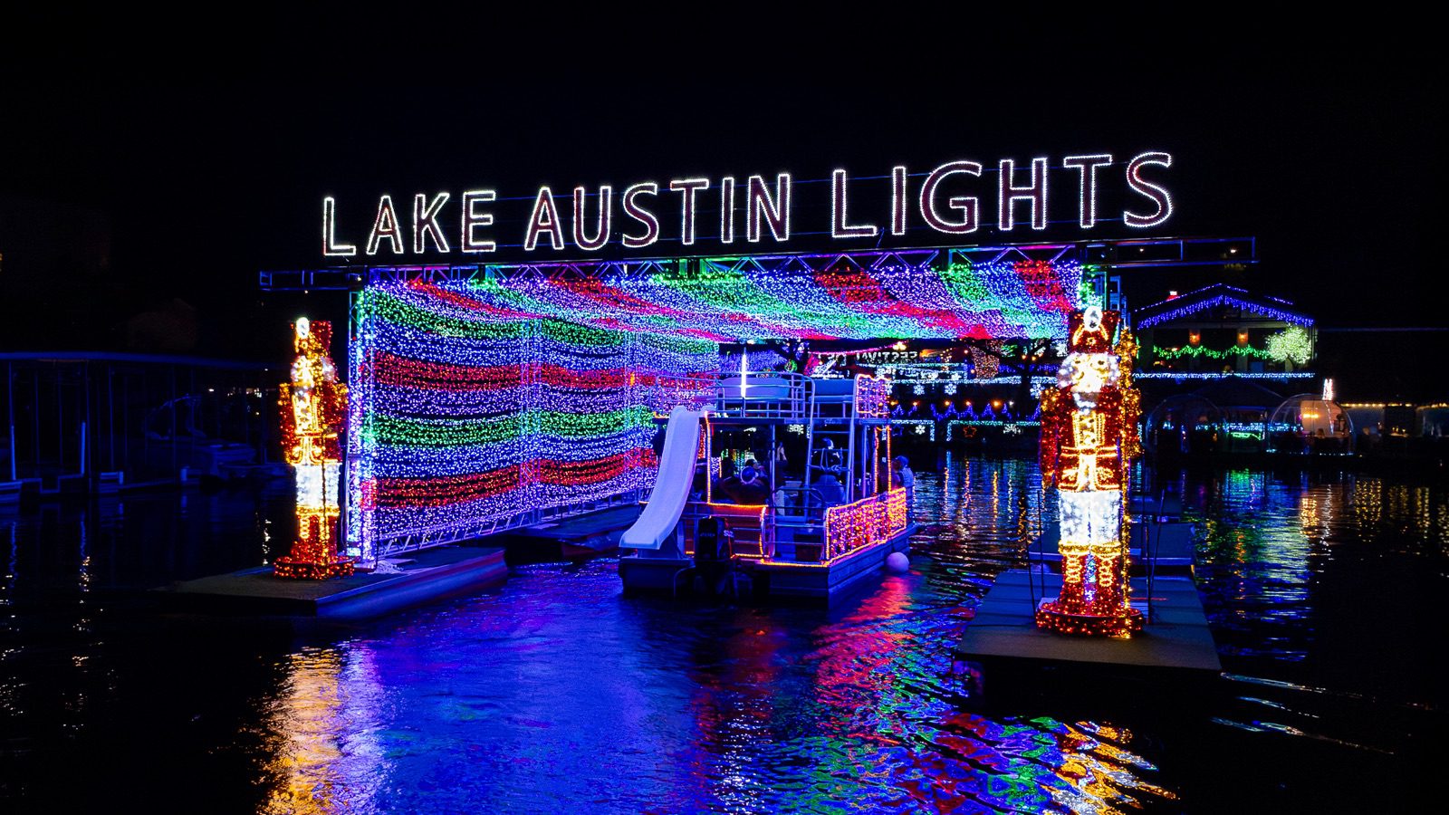 Lake Austin Lights floating tunnel reflected on the lake